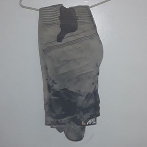 Tan and black Jean's w/ a  design created by me.